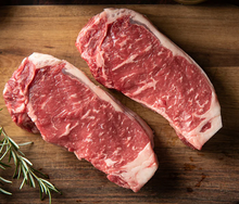 Load image into Gallery viewer, Premium beef; Wagyu F1 Porterhouse/sirloin (MB2) - $39/KG sold by the single roll (rrp $59/KG)